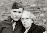 With his mother
